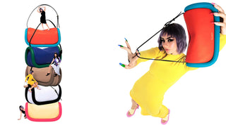 Stacked colorful handbags with mini women posing on white background and woman in yellow dress holding red handbag