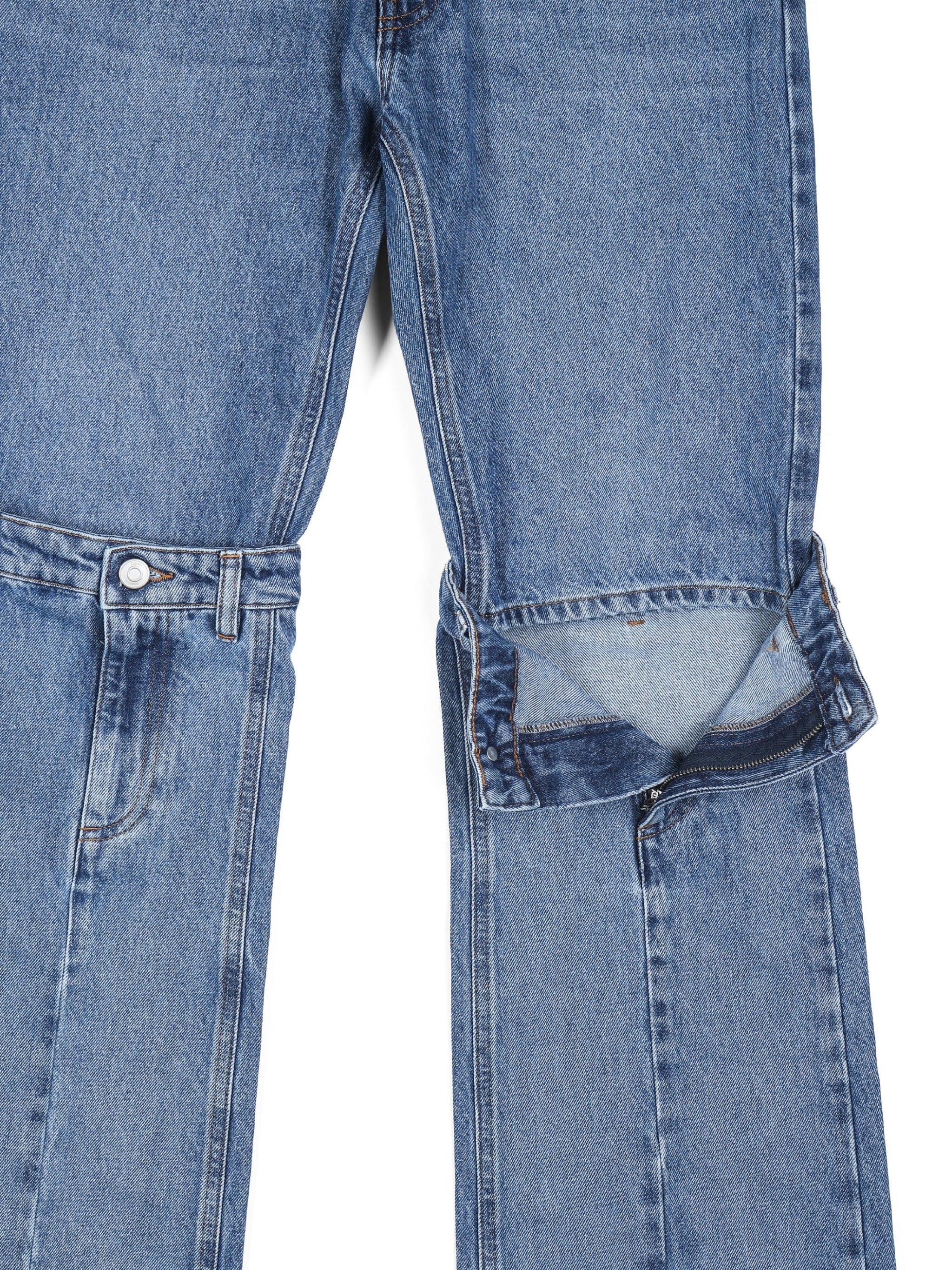 Blue denim convertible jeans with zip-off lower legs and snap buttons