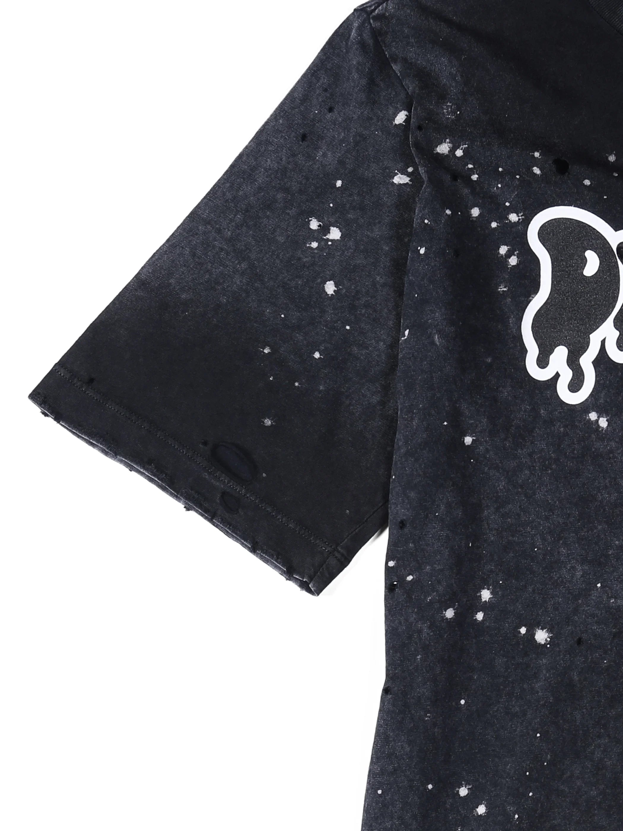 Black short sleeve t-shirt with white paint splatter and distressed holes detail
