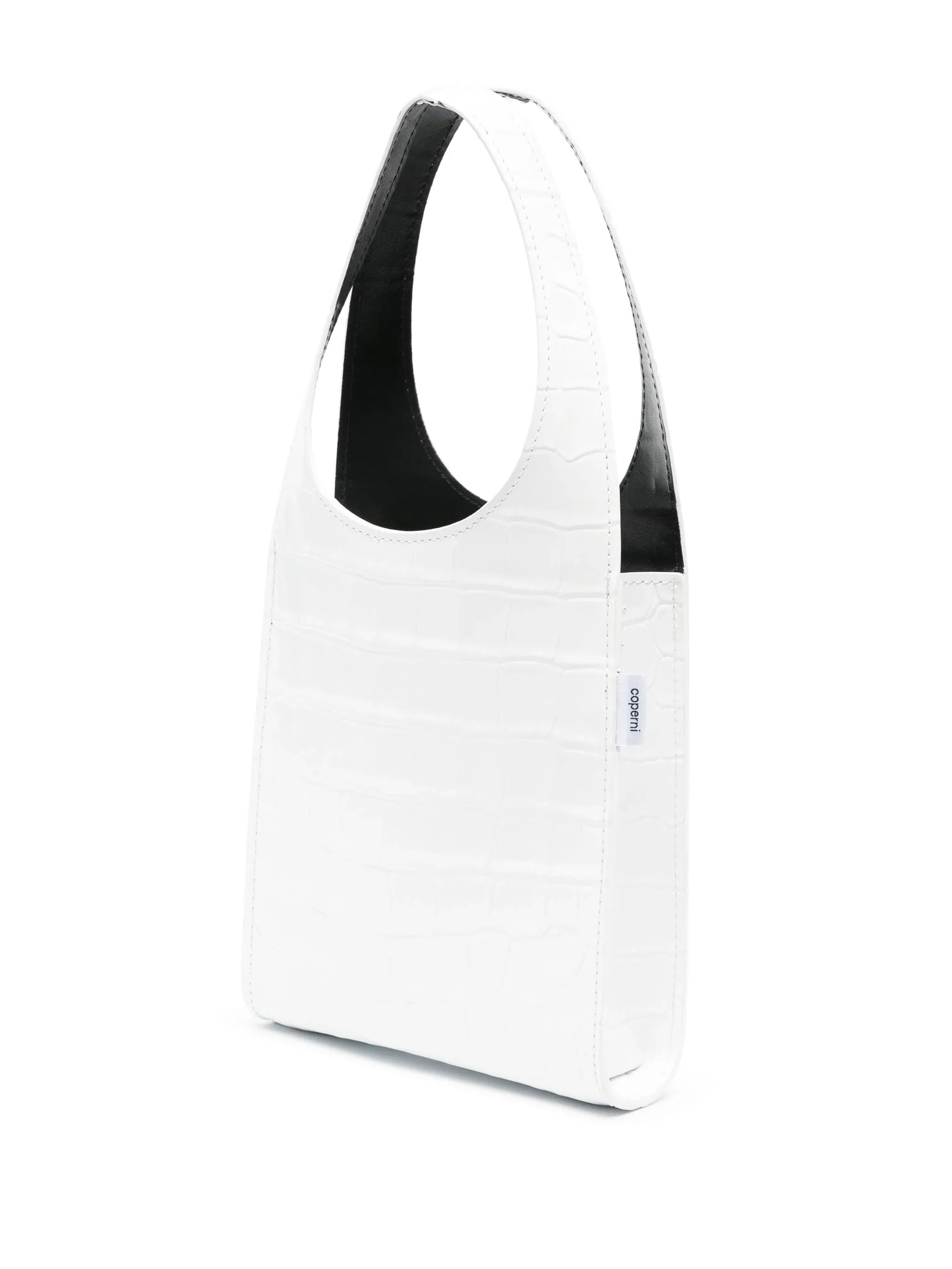 White crocodile-embossed leather shoulder bag with black interior and Coperni label