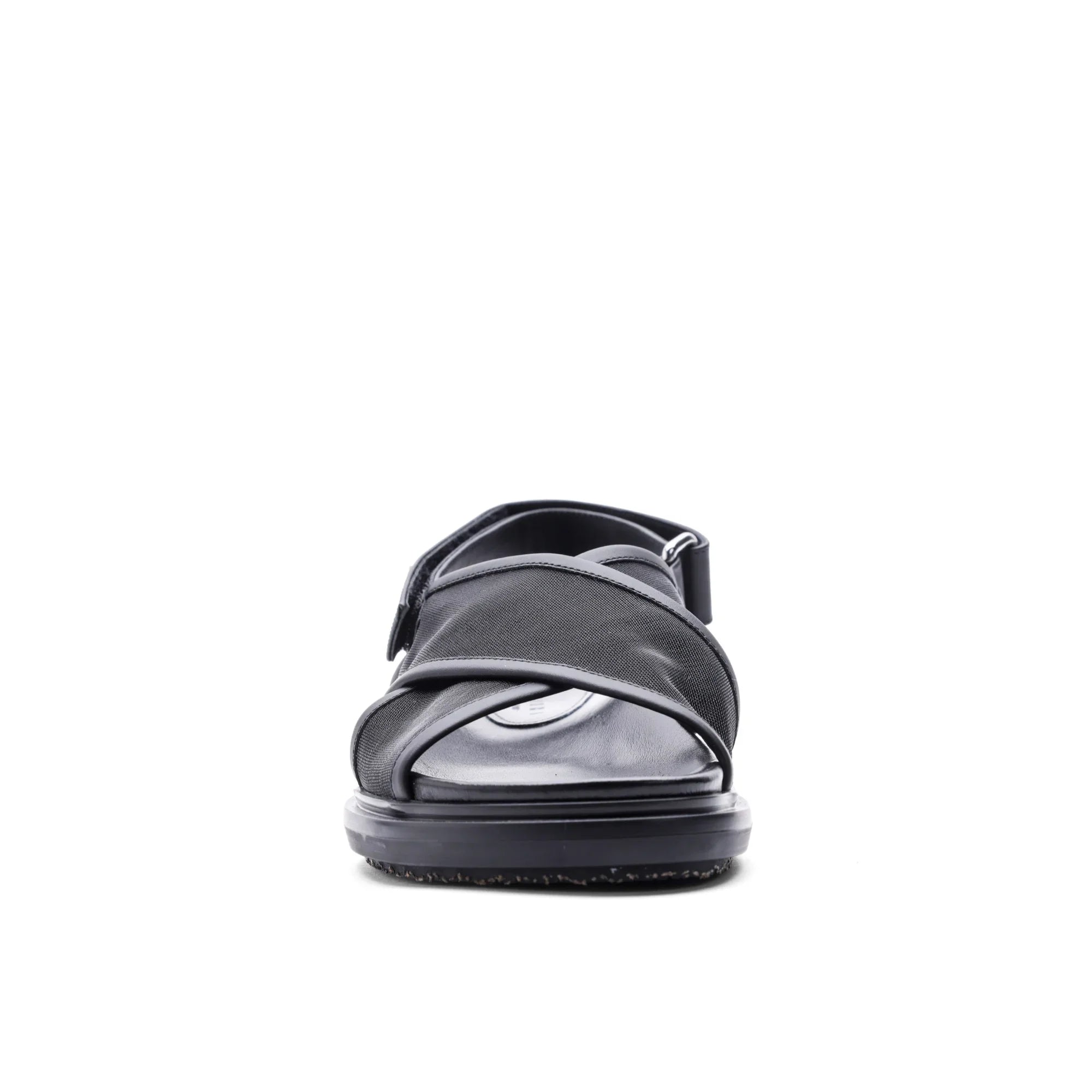 Front view of black open-toe sandal with crisscross straps and adjustable ankle buckle