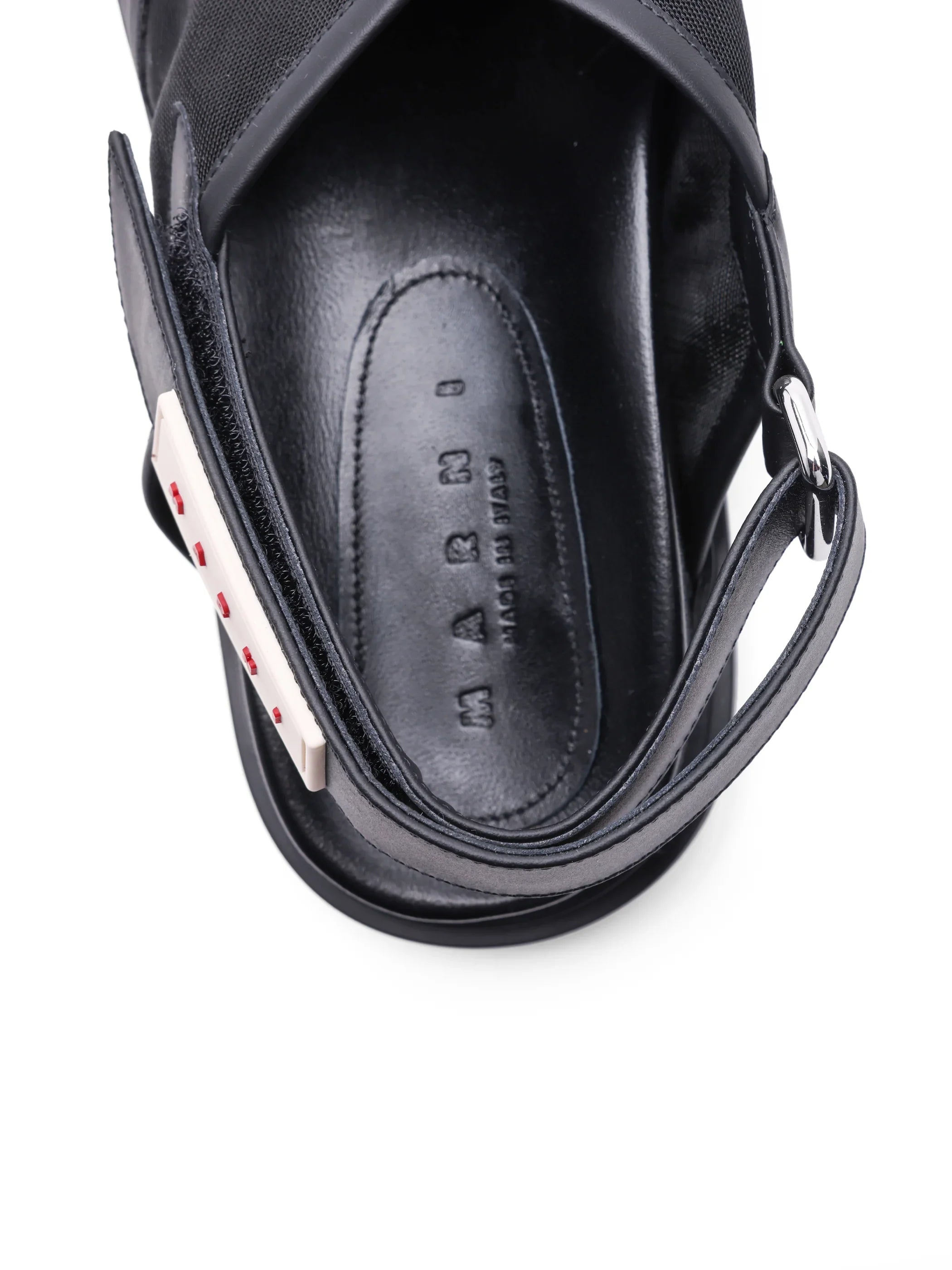 Top view of black Mari Italian leather sandal with adjustable strap and red stud detailing