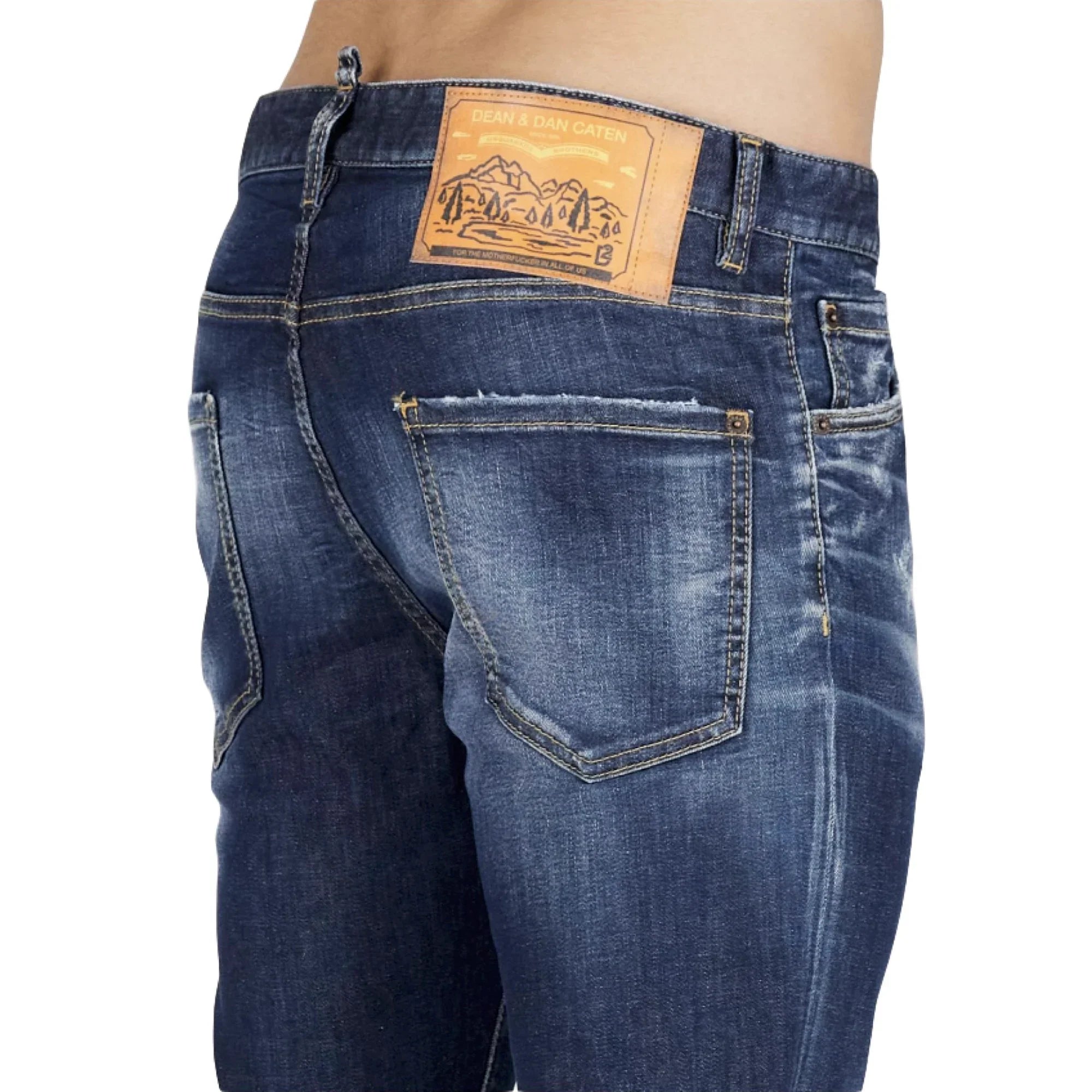 Back view of blue denim jeans with leather patch label and visible stitching