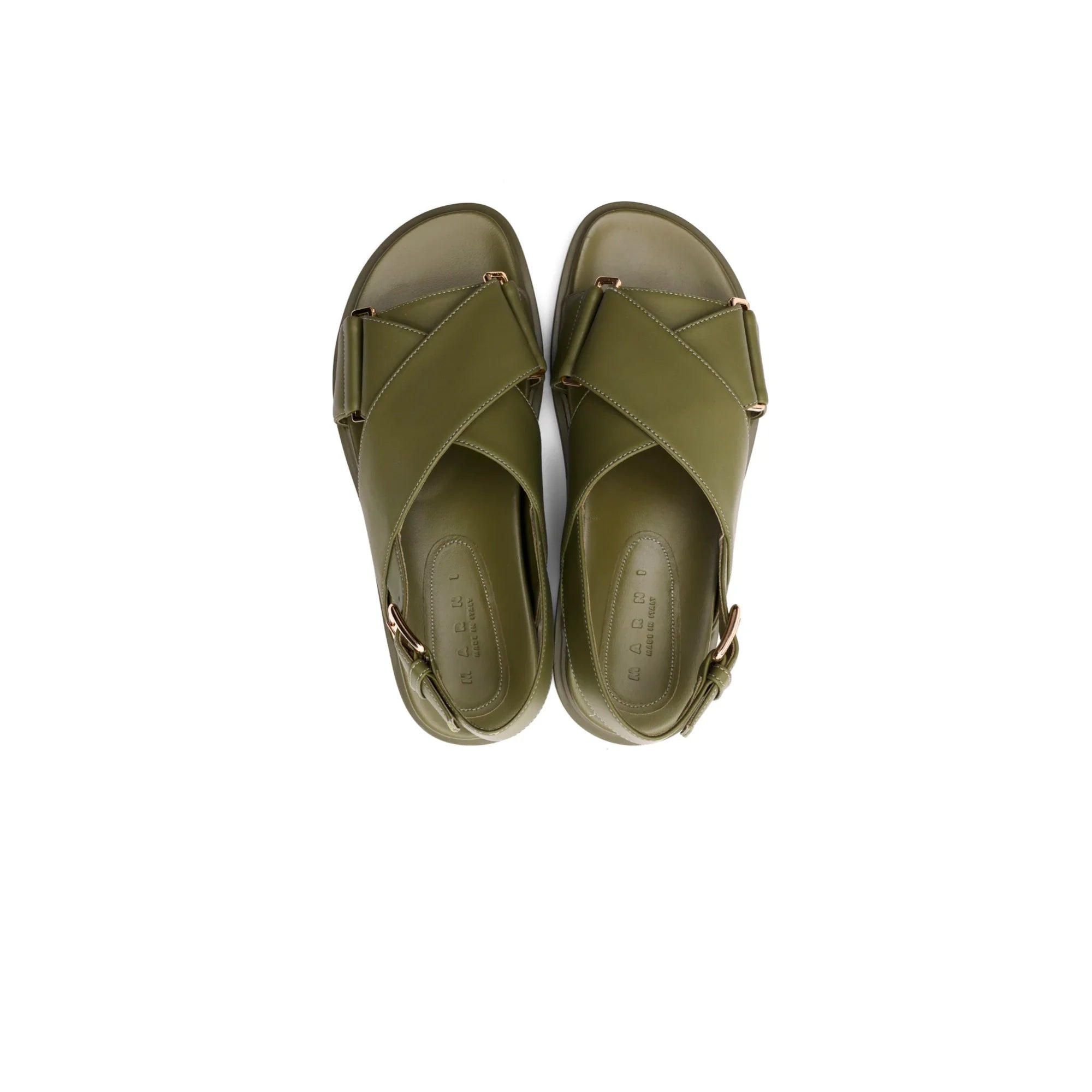 Top view of olive green leather cross-strap sandals with gold buckle on white background