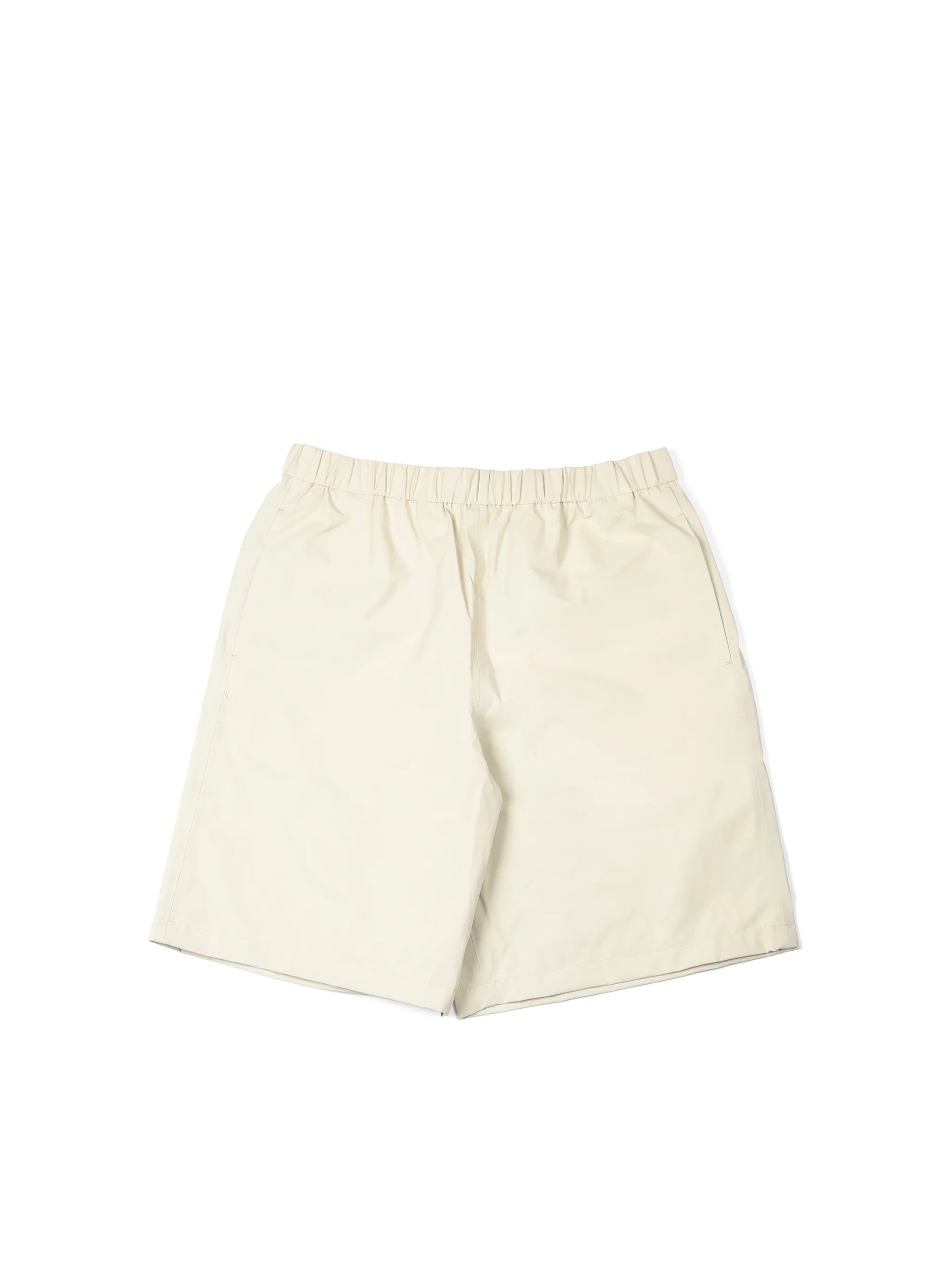 Beige casual shorts with elastic waistband and side pockets on white background