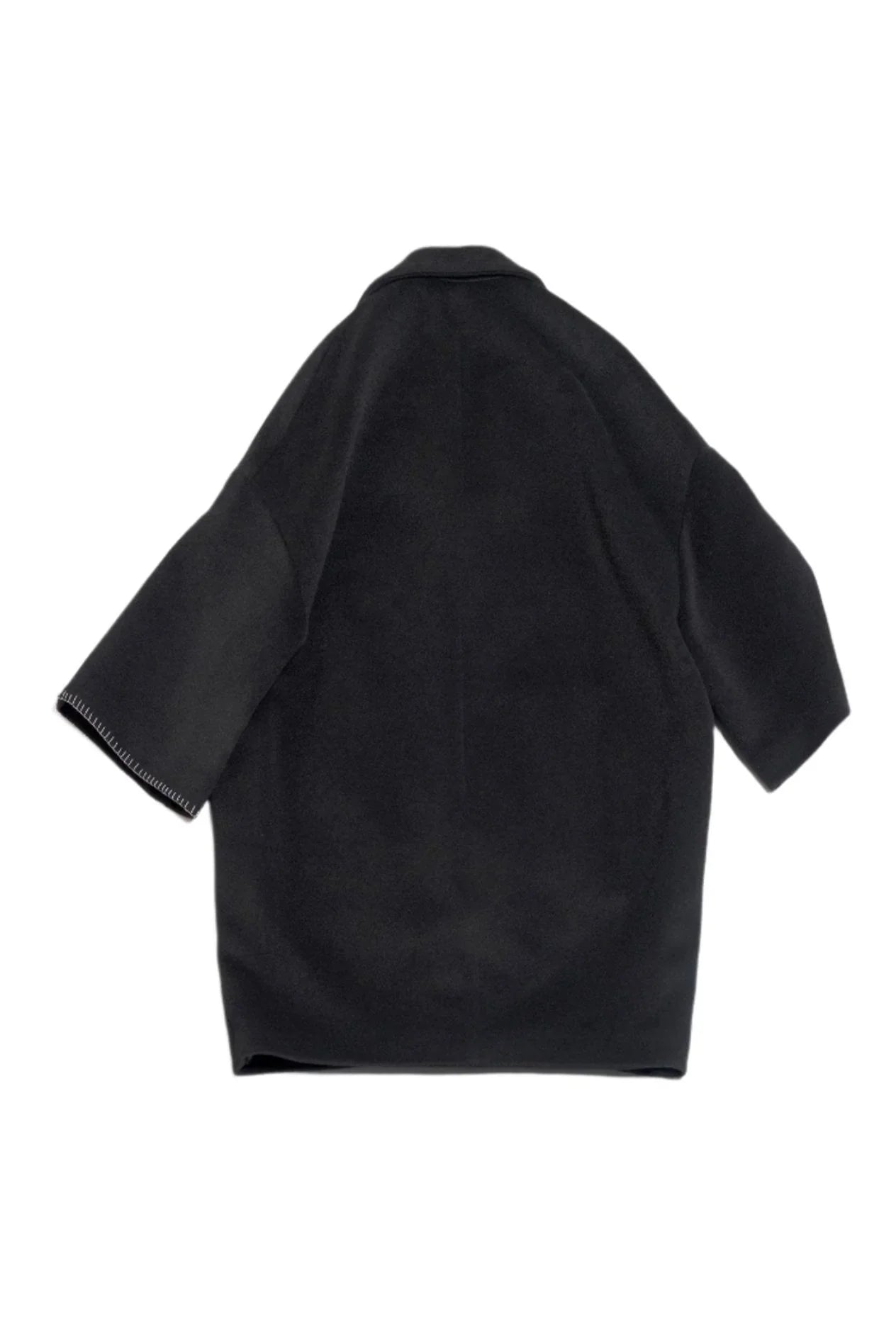 Black oversized wool coat with wide sleeves and white stitch detail on cuff against white background