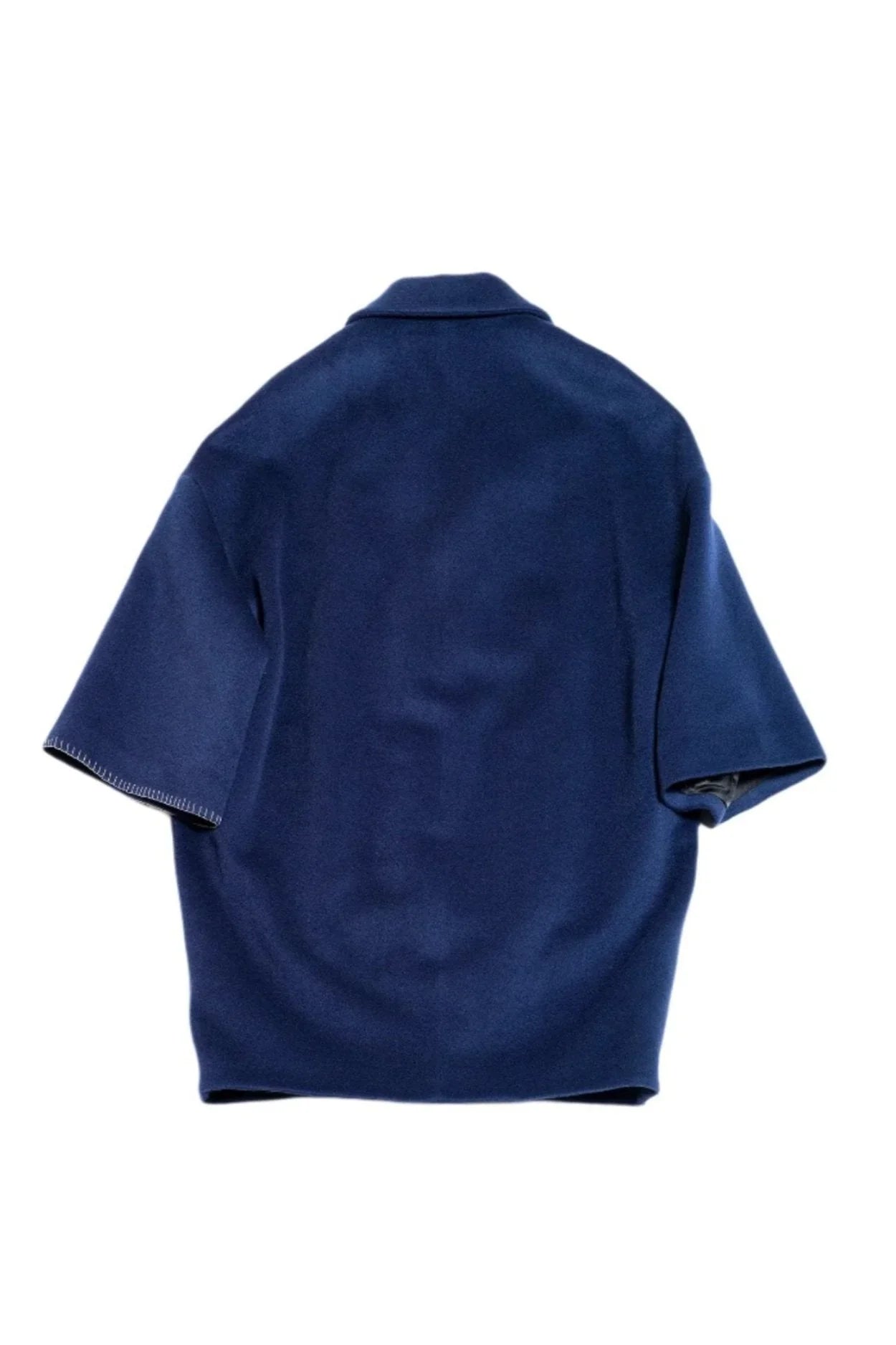Back view of navy blue short-sleeve wool jacket with collar on white background