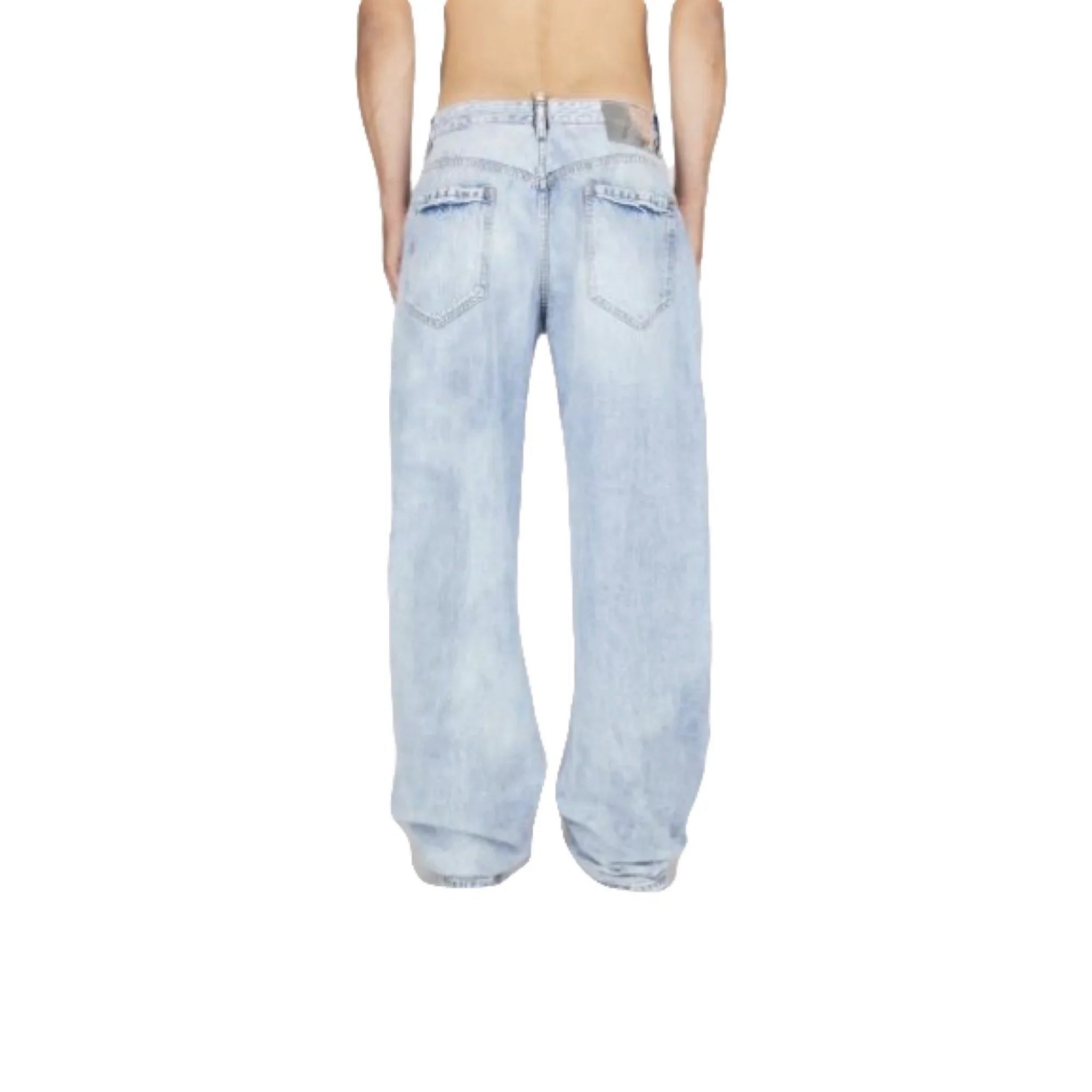Back view of light blue baggy jeans with rear pockets on a model against white background