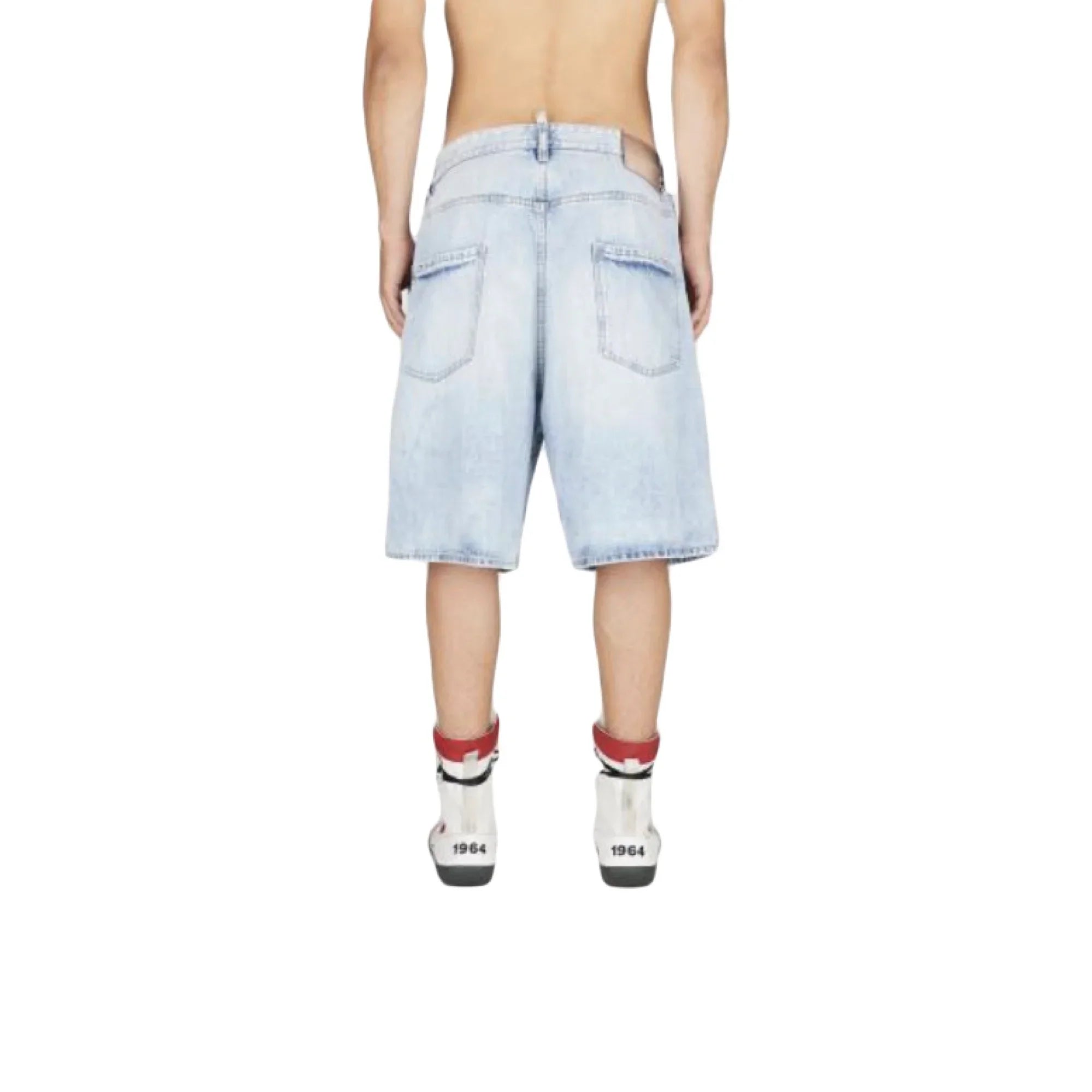 Back view of light blue denim shorts with oversized pockets worn by a shirtless male model