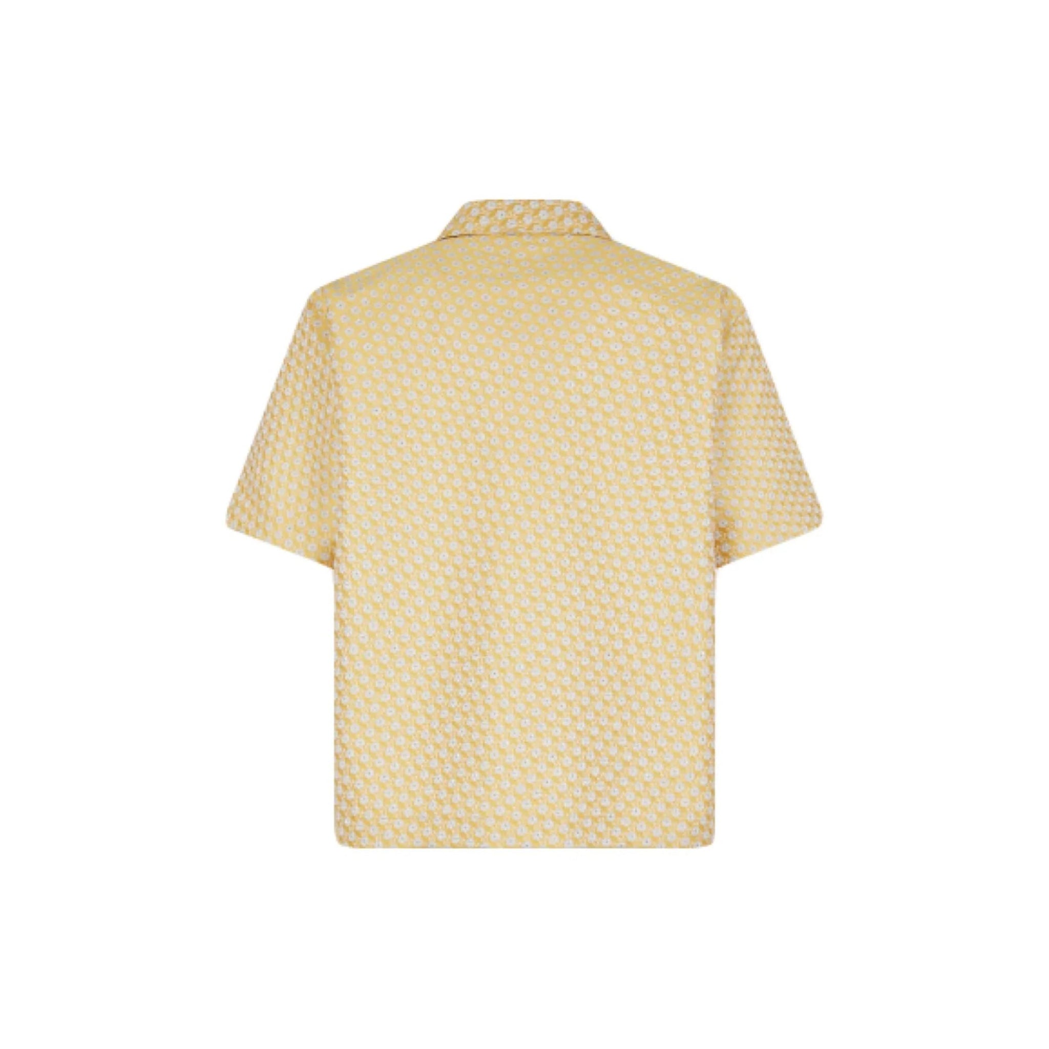 Back view of yellow short-sleeve Hawaii shirt with small white flower pattern
