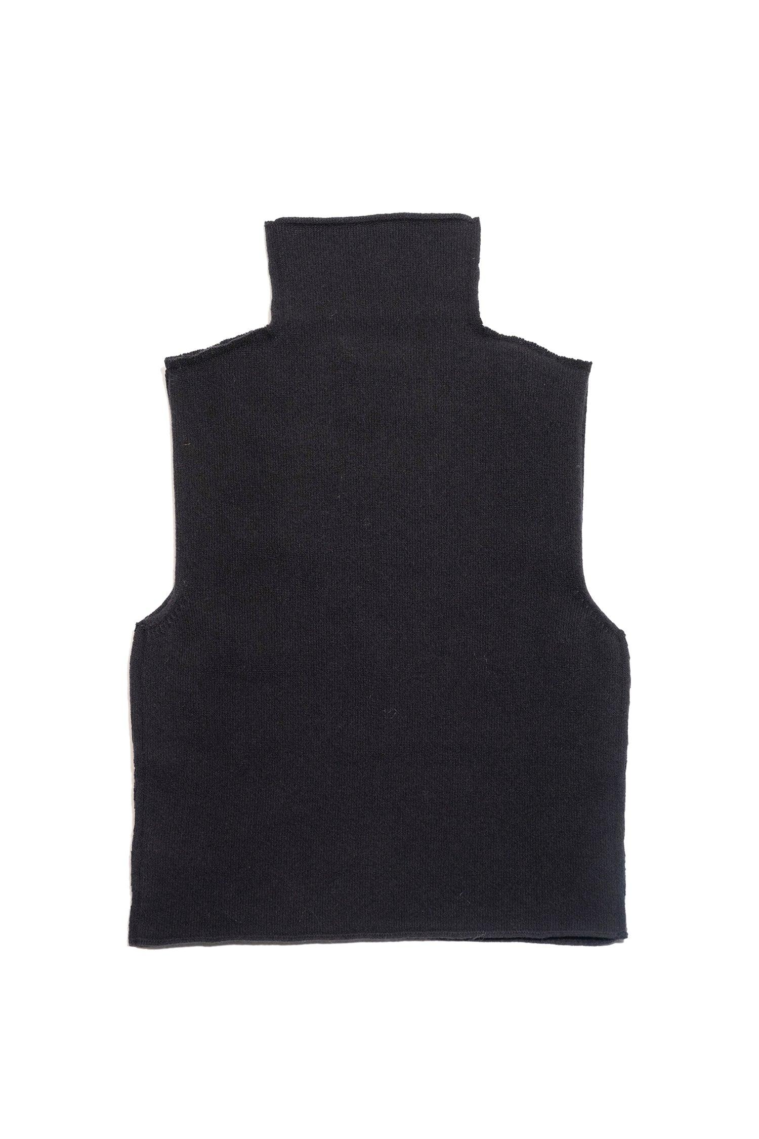 Black sleeveless knit turtleneck sweater, square-cut armholes, flat lay on white background