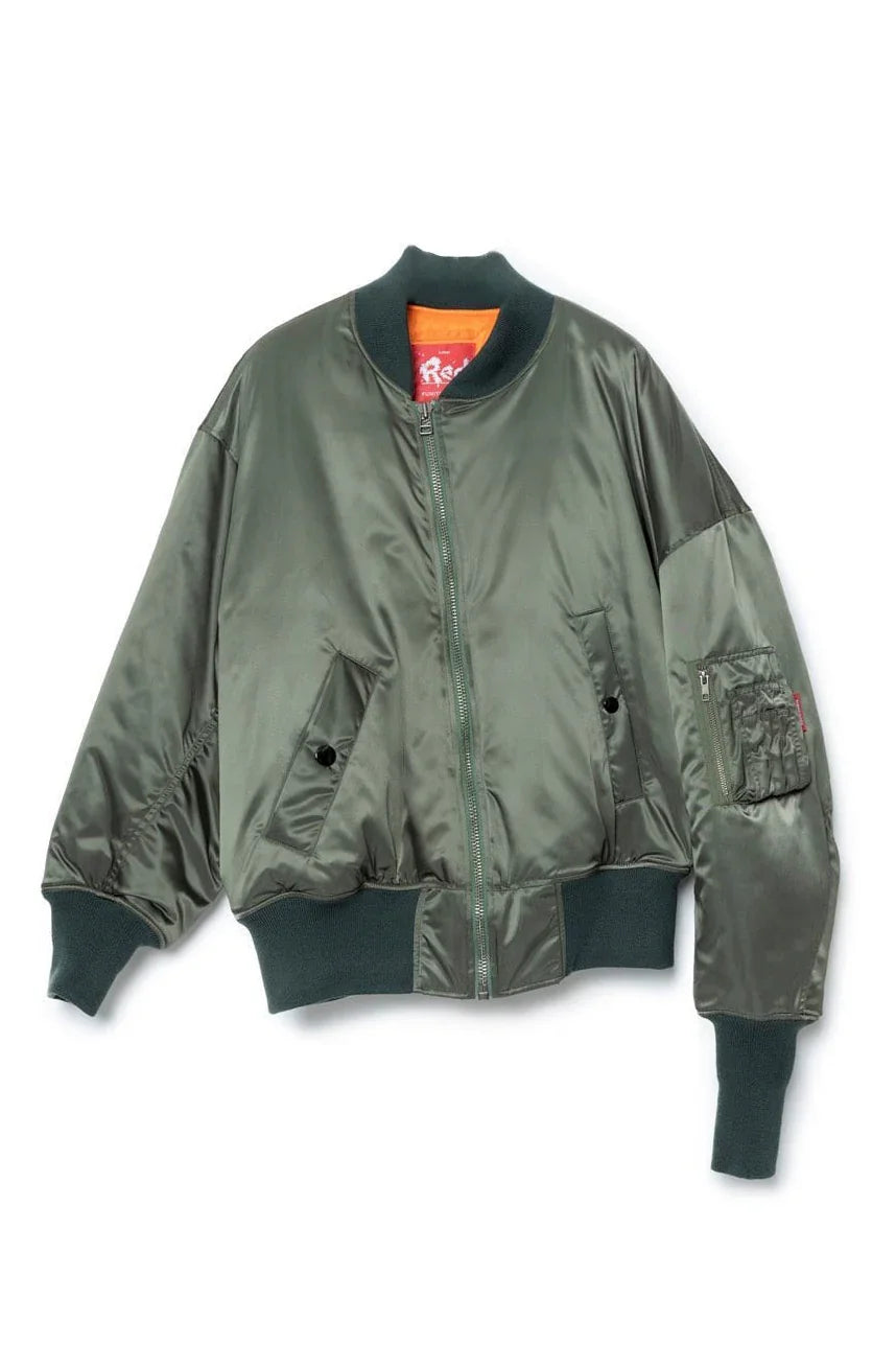 A khaki green, high-density nylon jacket with long asymmetrical sleeves, featuring arm slits, snap closure on the front pockets, and adjustable bands at the waist, collar, and wrists.