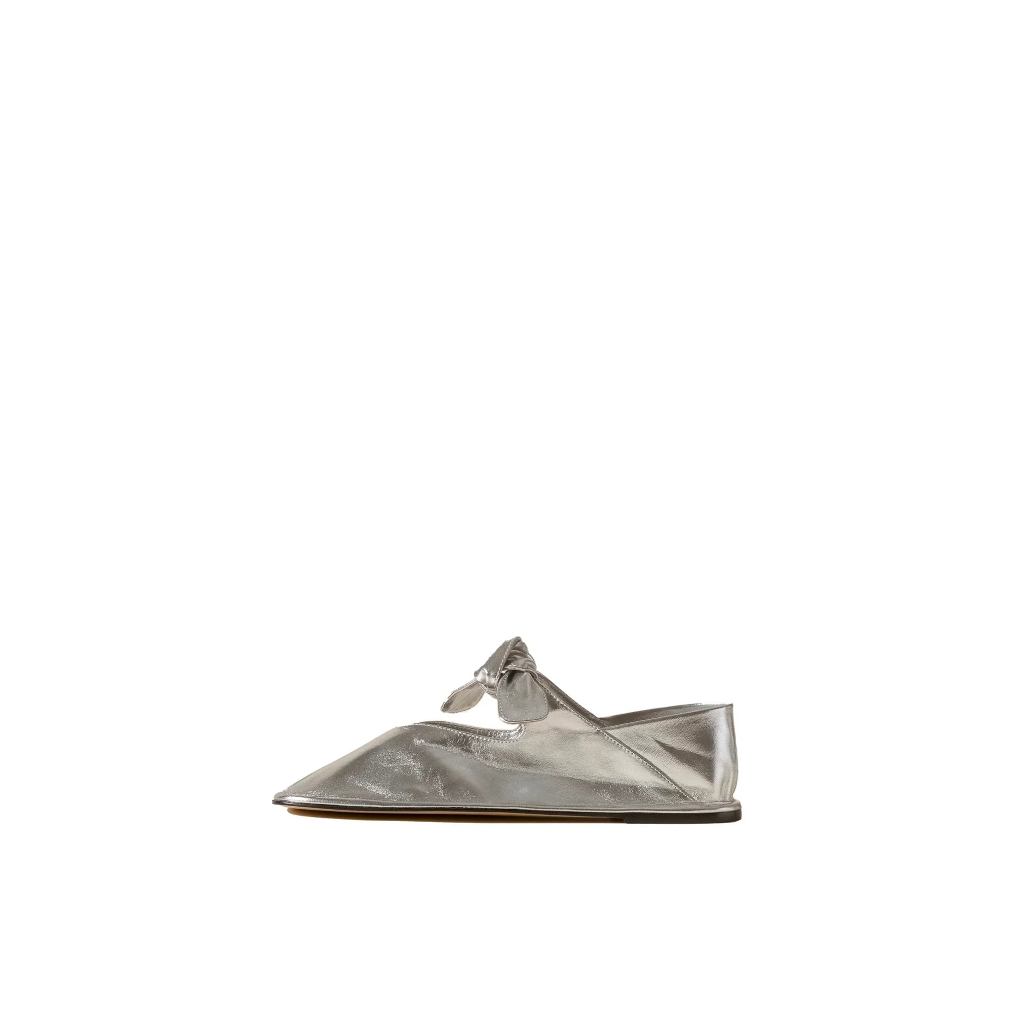 Silver metallic flat shoe with pointed toe and decorative knot detail on side