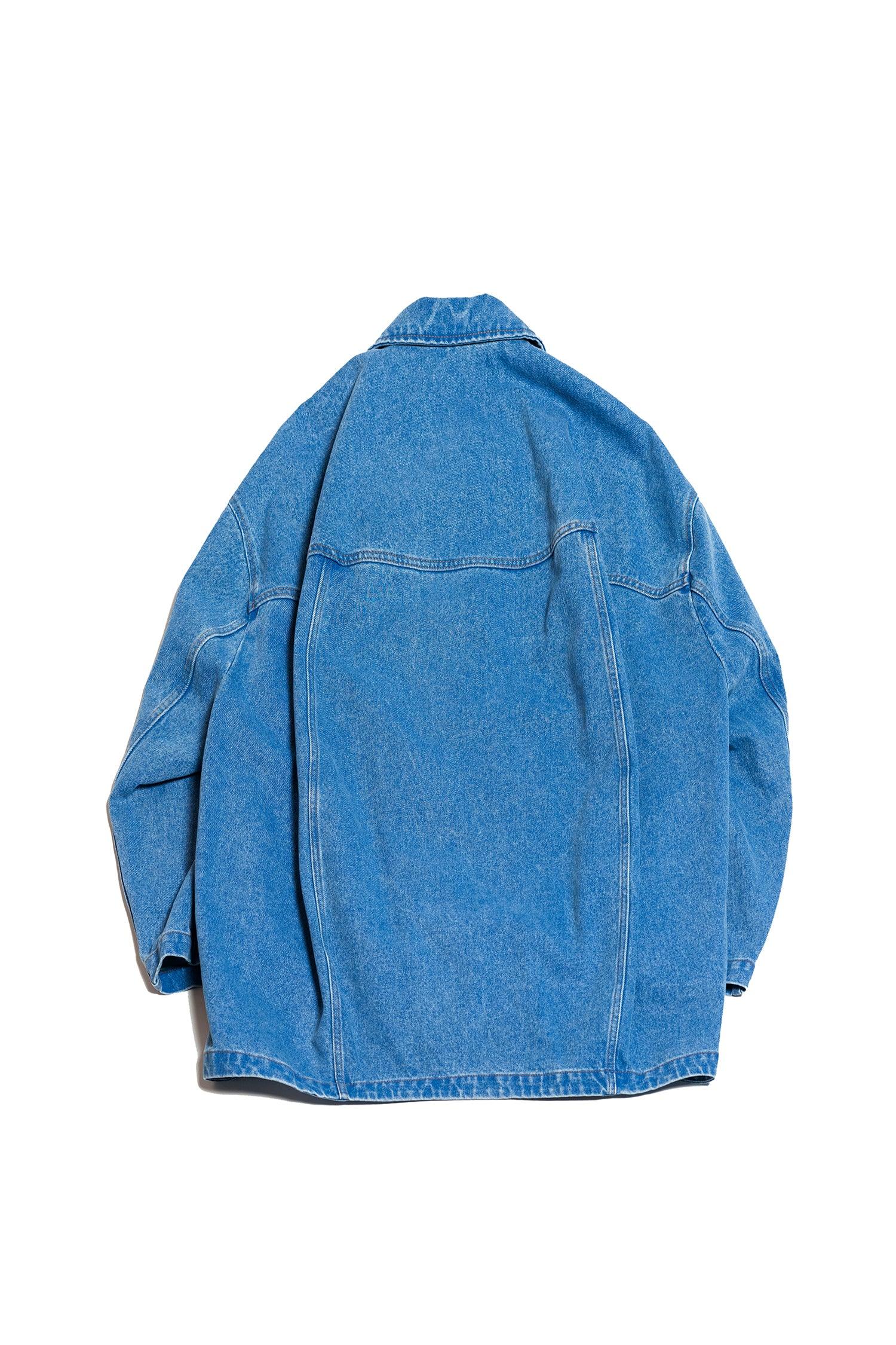 Back view of oversized blue denim jacket with wide sleeves and collar on white background