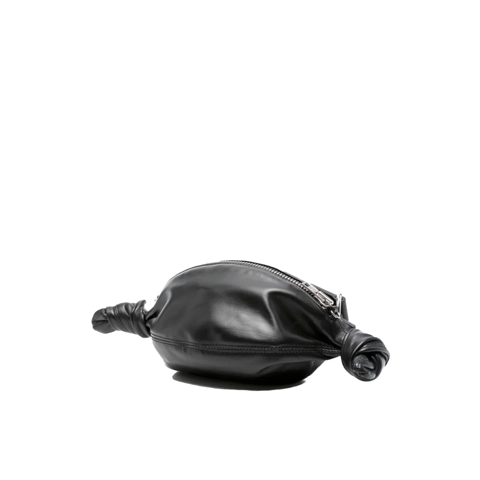 Black leather knotted candy-shaped handbag with silver zipper on white background