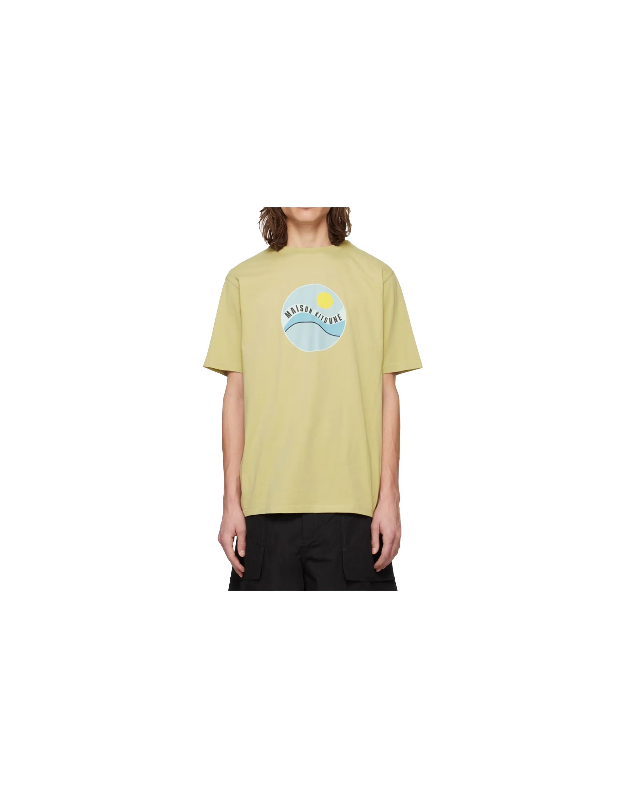 Front view of person wearing Maison Kitsuné yellow tee shirt with circular sun and wave graphic