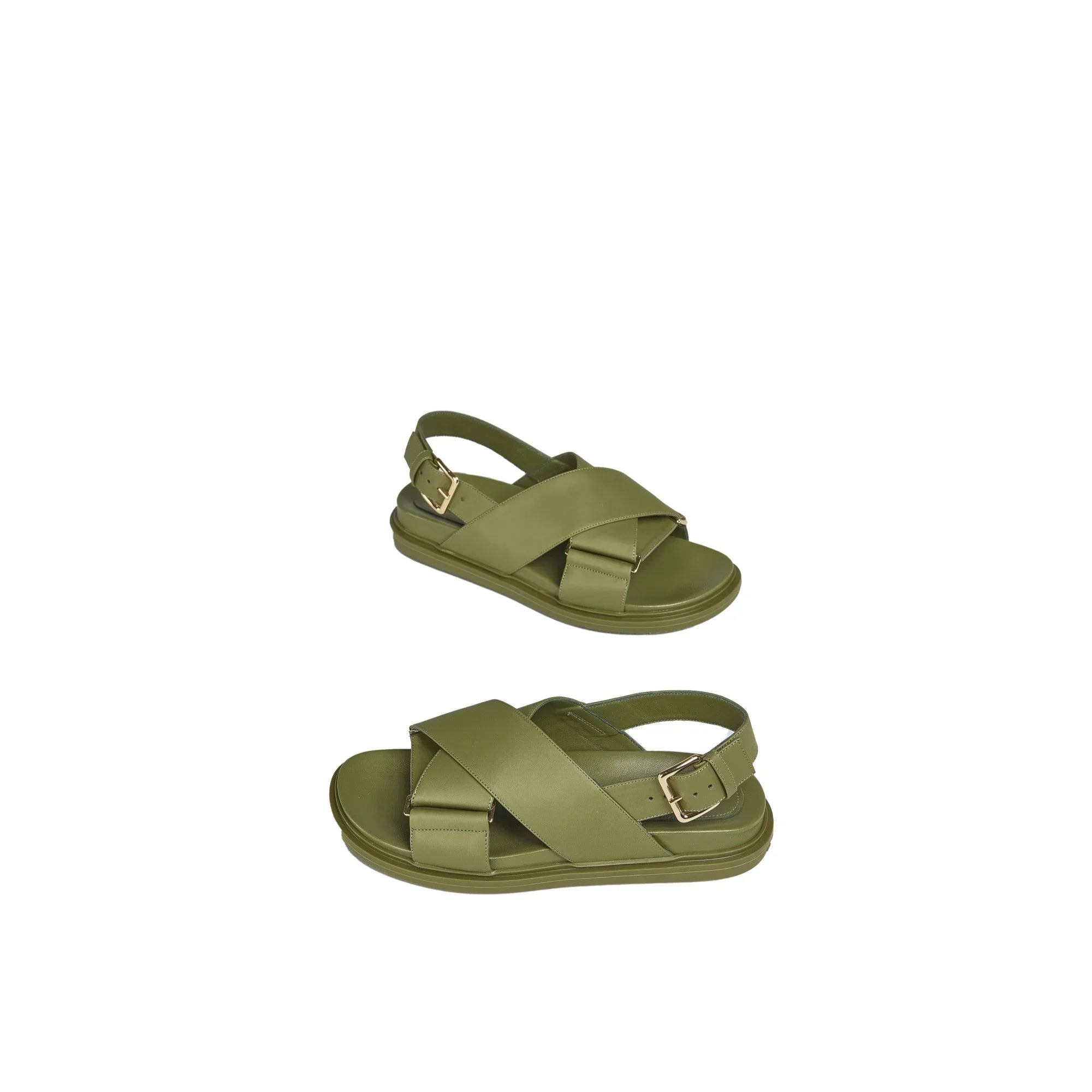 Pair of olive green crisscross strap sandals with gold buckle on white background