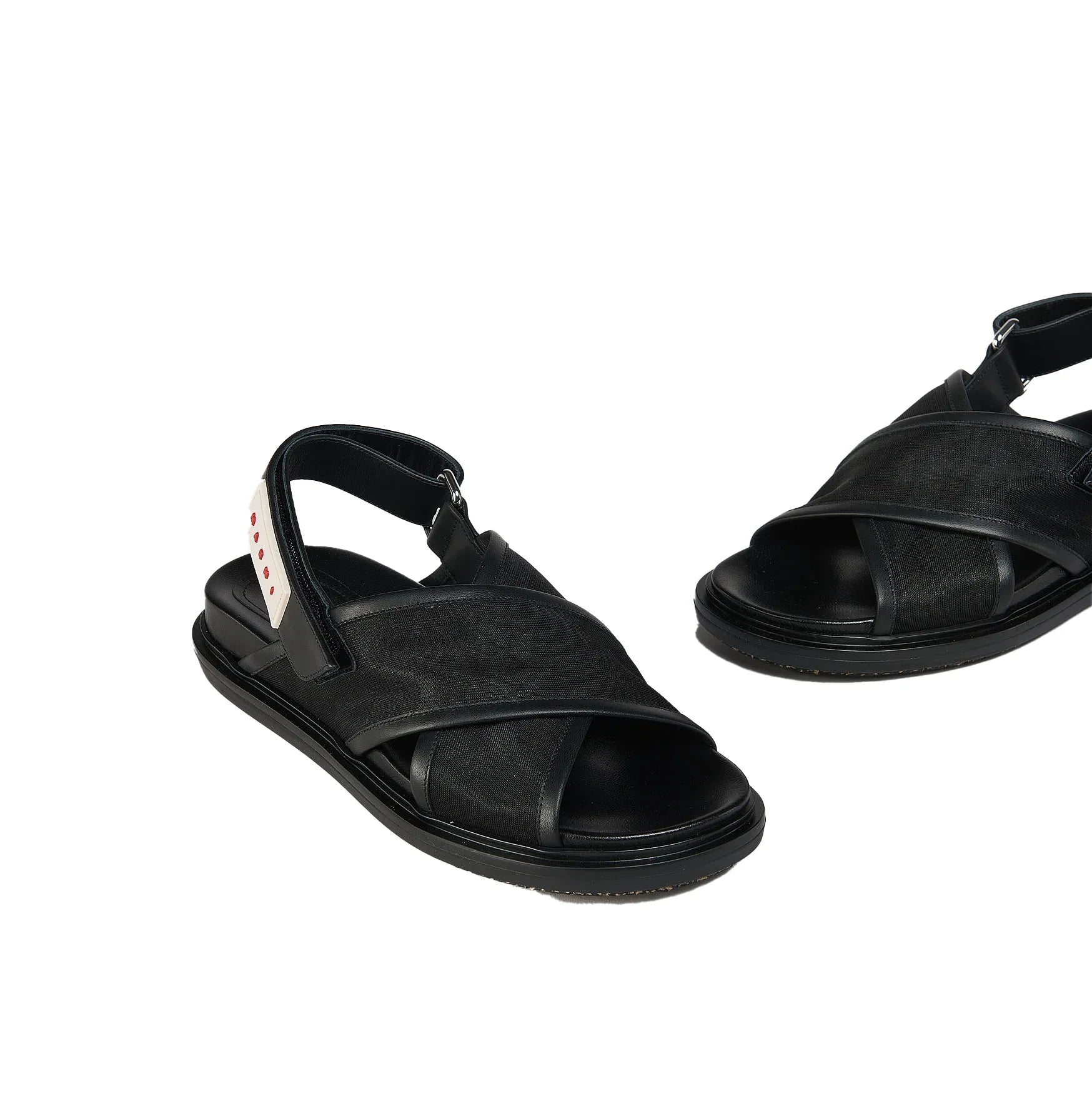 Black men's sandals with crisscross straps and adjustable back strap on white background