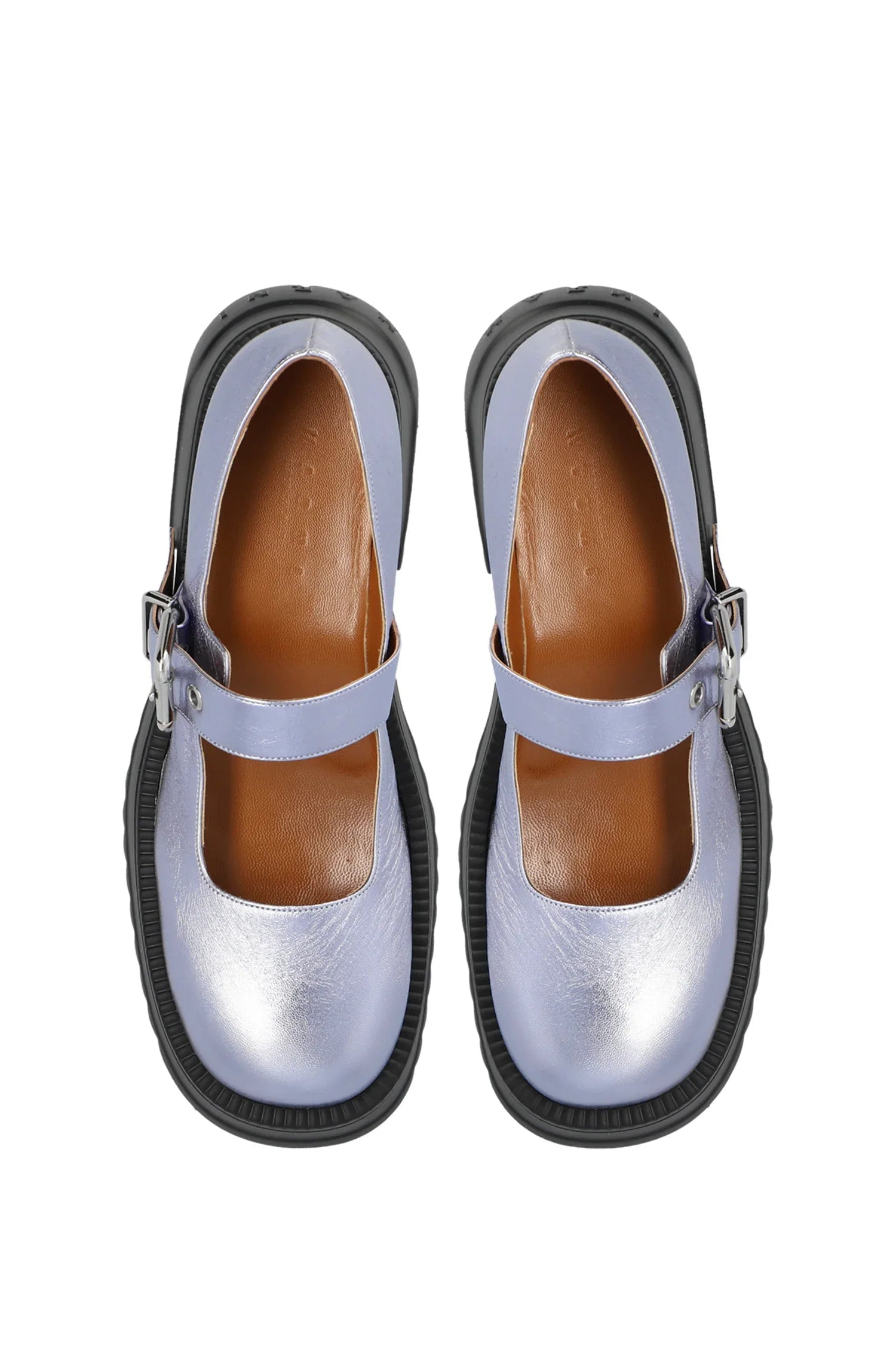 Top view of metallic lavender Mary Jane shoes with black chunky soles and silver buckle straps