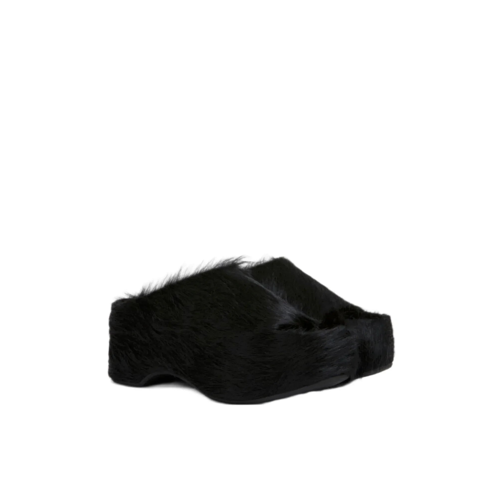 Black fur mule slippers with a pointed toe and low heel on white background