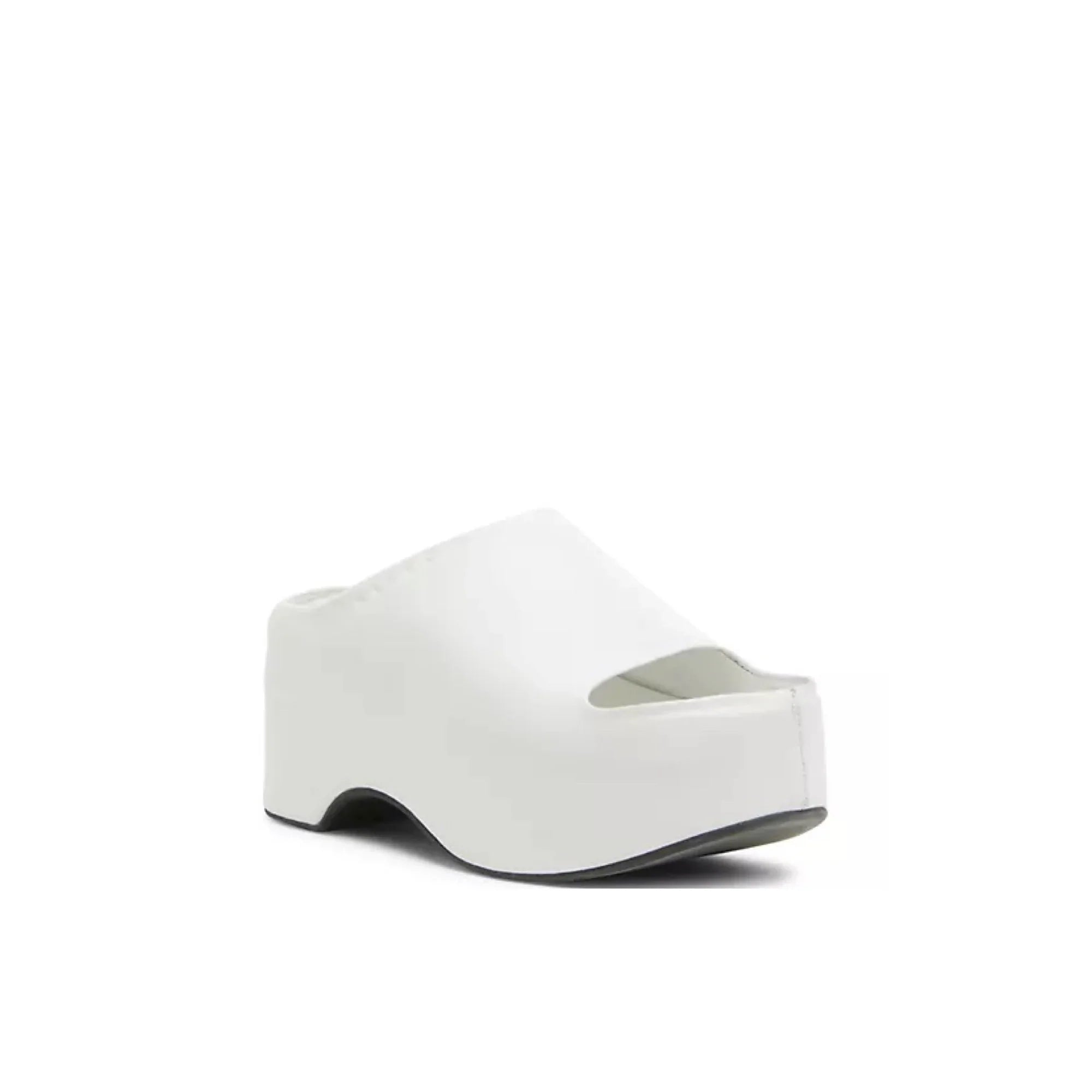 White platform clog shoe with open toe and black sole on white background
