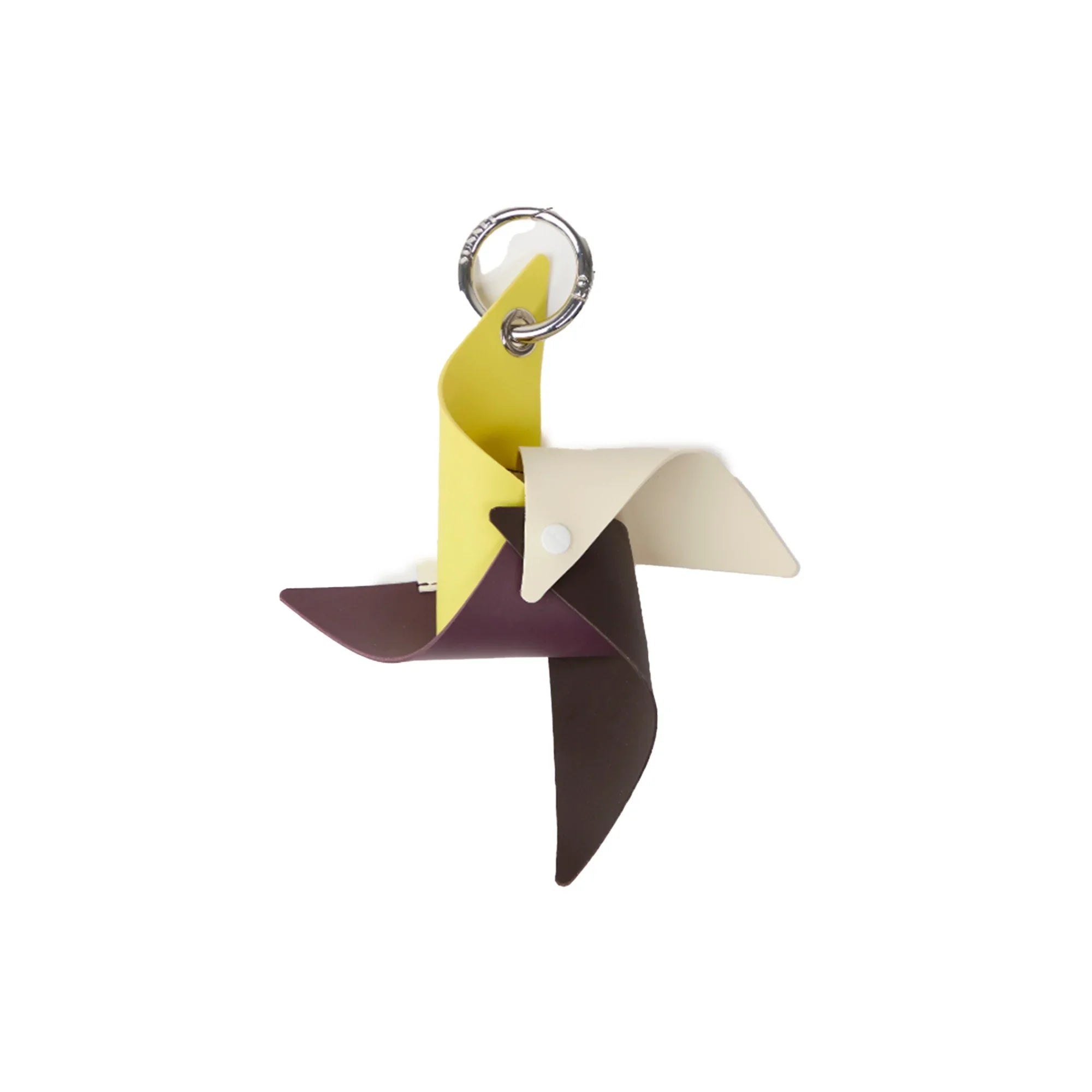 Colorful leather pinwheel keychain with yellow, beige, and brown blades on a metal ring