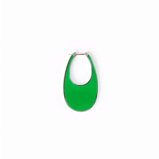Green earring on a white background