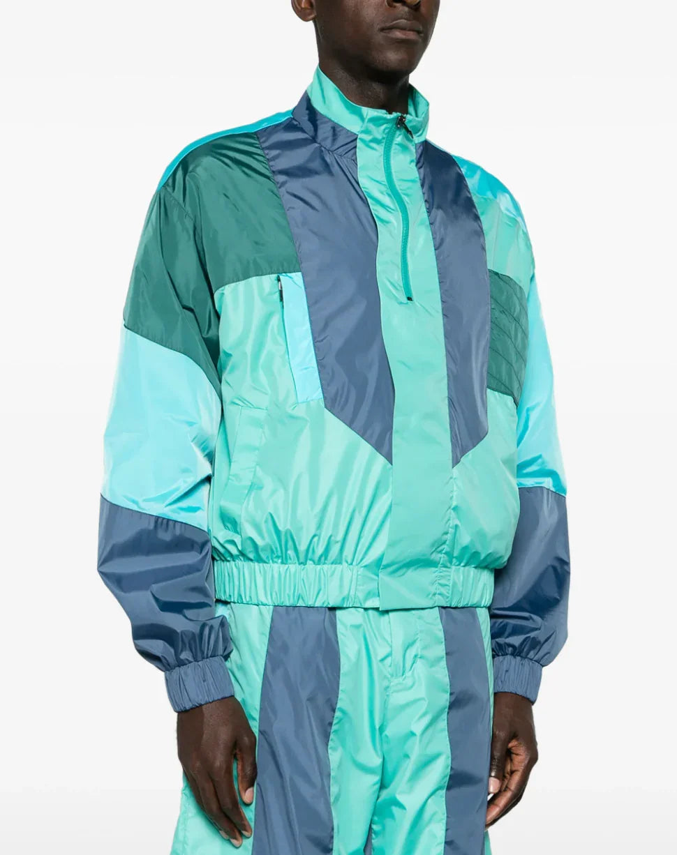 Men's color-block teal and blue nylon track jacket and pants set with zip-up collar and elastic cuffs