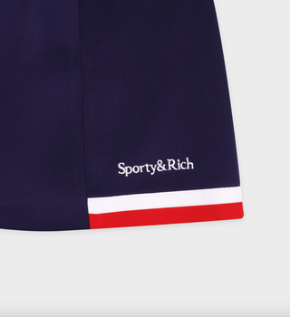 SPORTY & RICH Serif Logo Mila Pleated Skirt