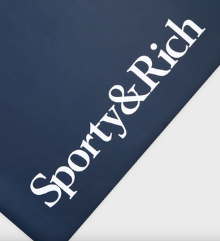 SPORTY & RICH Serif Logo Yoga Mat