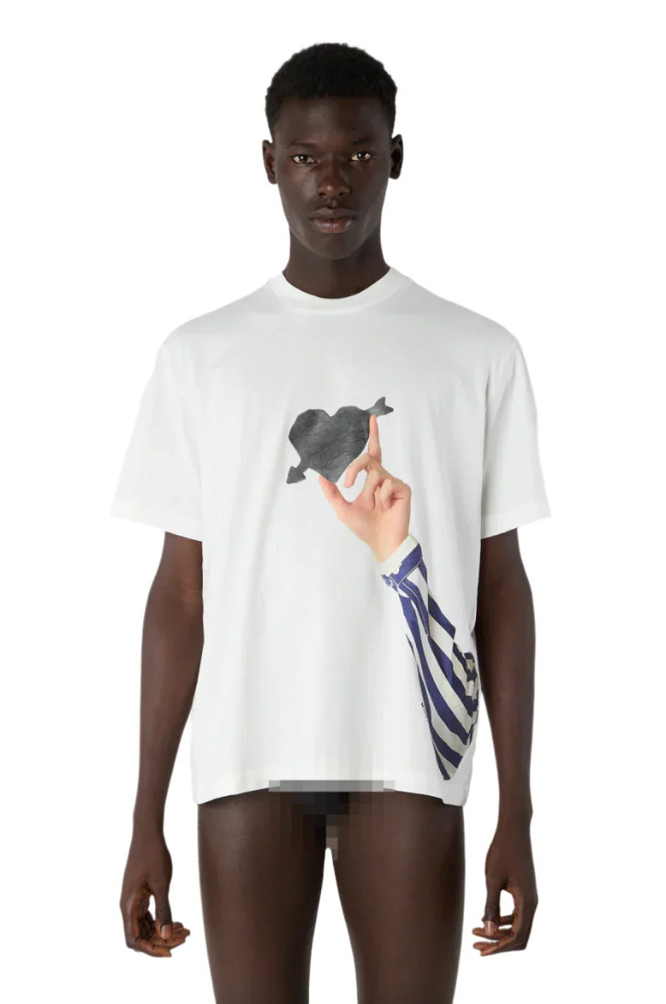 Model wearing white T-shirt with heart and arrow graphic and realistic printed striped sleeve with hand