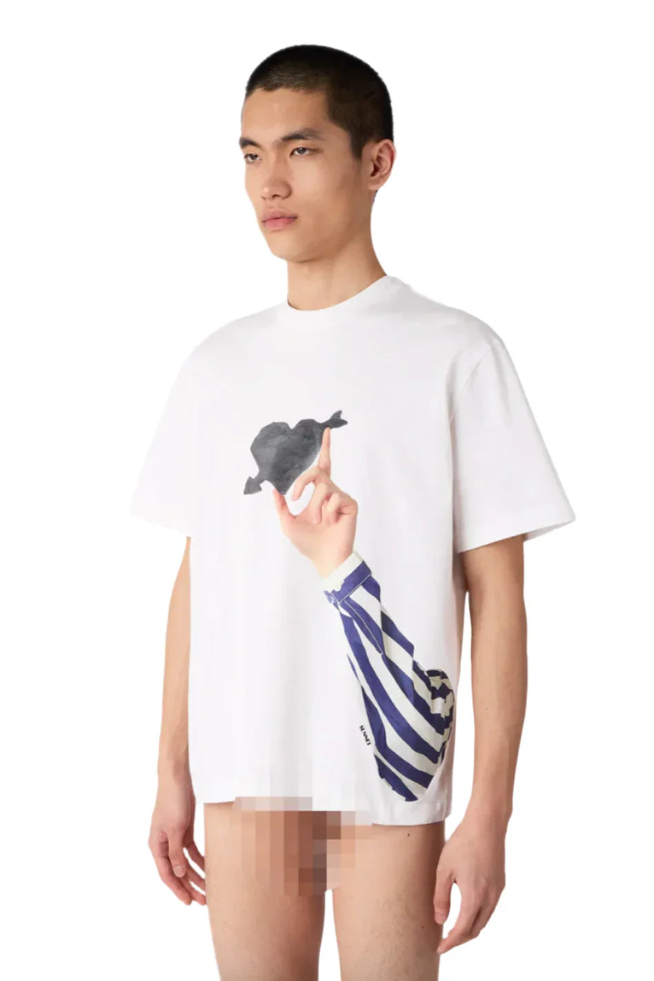 Model wearing white graphic T-shirt with an arm and hand print pointing at fish silhouette