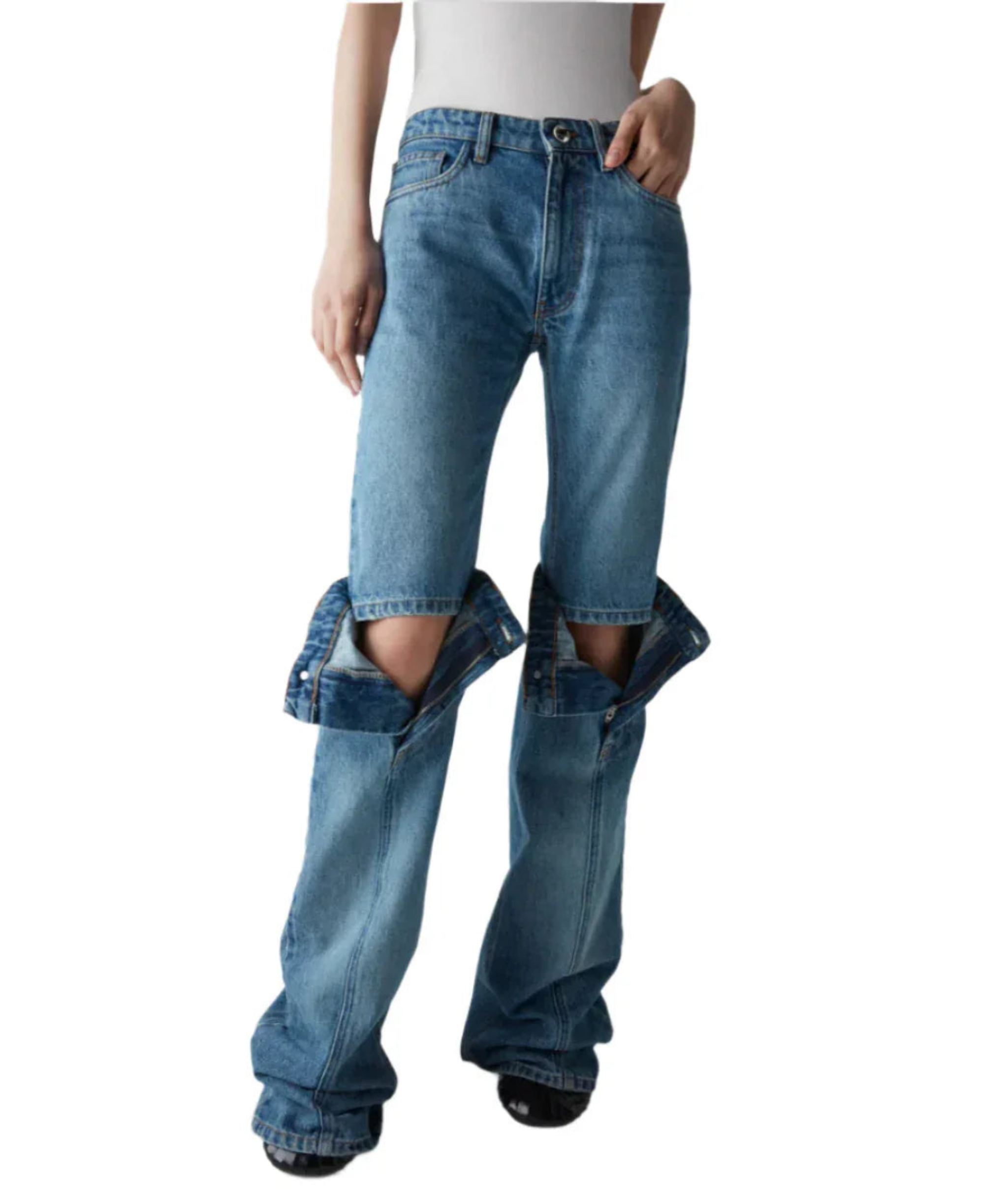 Woman wearing unique blue denim jeans with the upper pant legs converted to shorts and lower legs attached separately