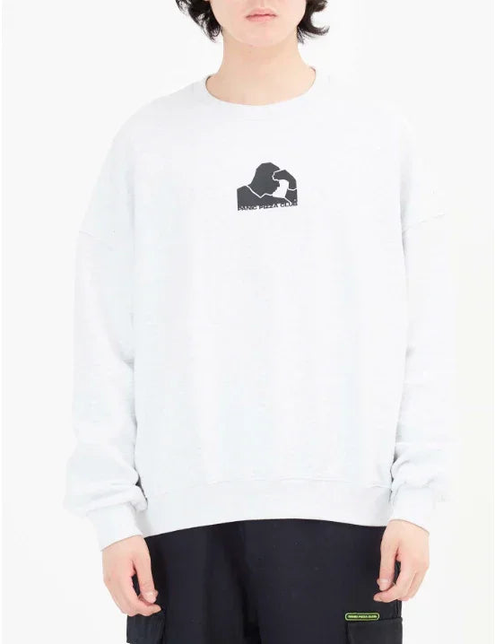Person wearing white sweatshirt with black graphic and text 'SANG PIZZA CLUB'